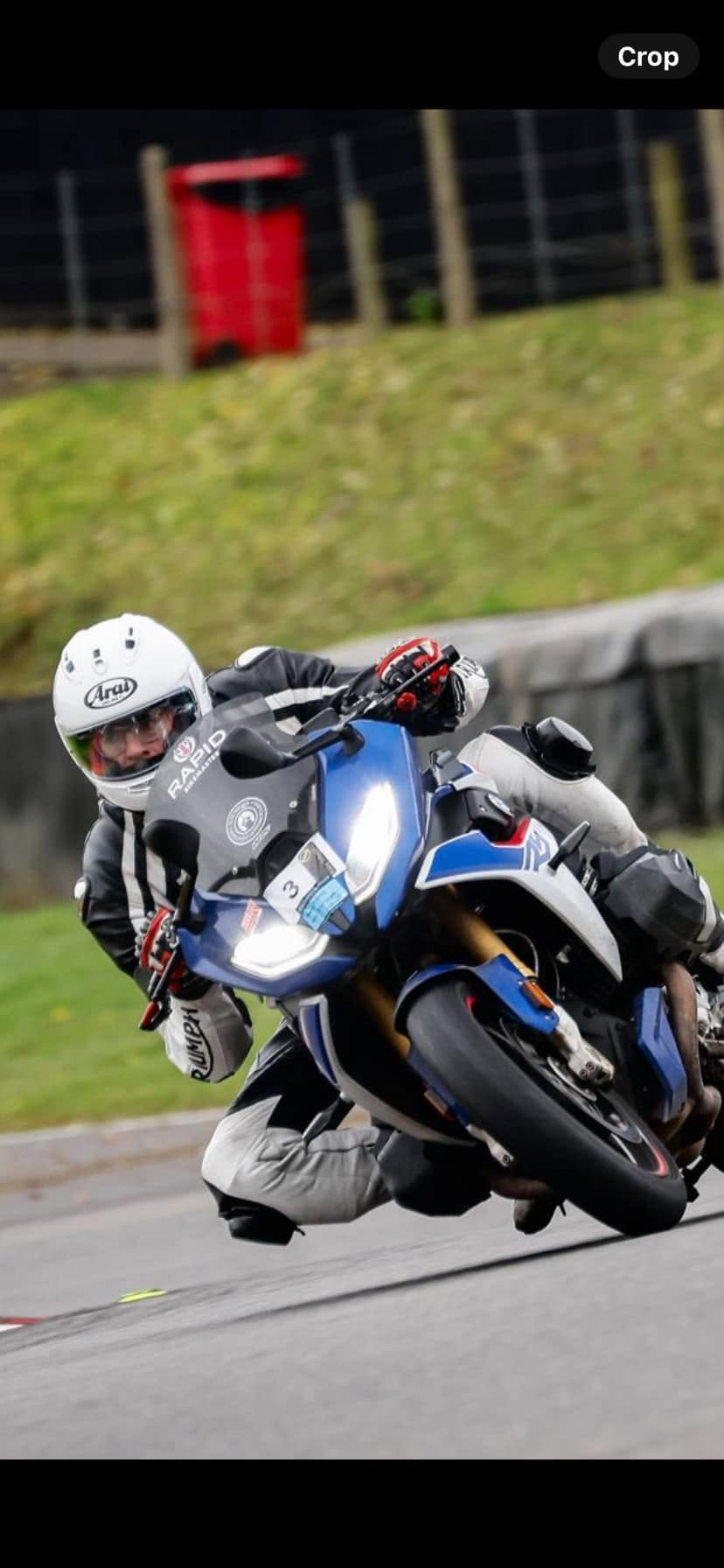 Advanced motorcycle rider receiving roadcraft coaching