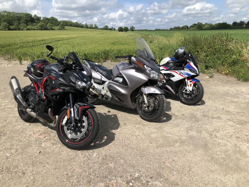 Motorcyclists taking part in a group coaching session